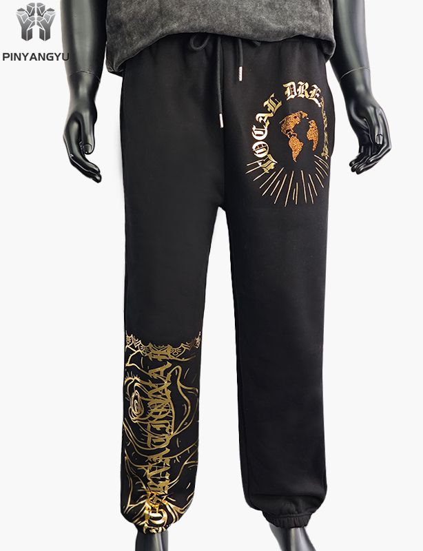 Pantalon avec motif strass et estampage doré