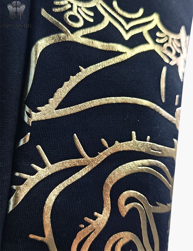 Pantalon avec motif strass et estampage doré
