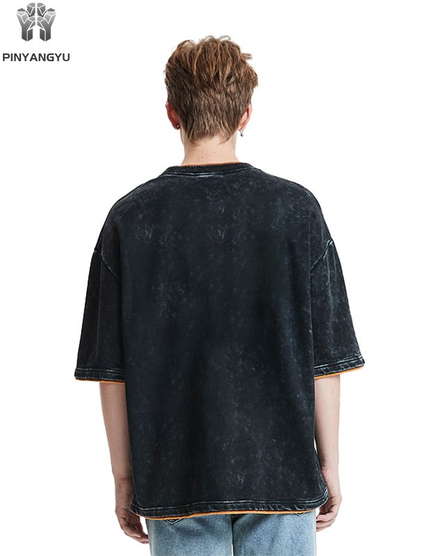 T-shirt à effet délavé et patchwork